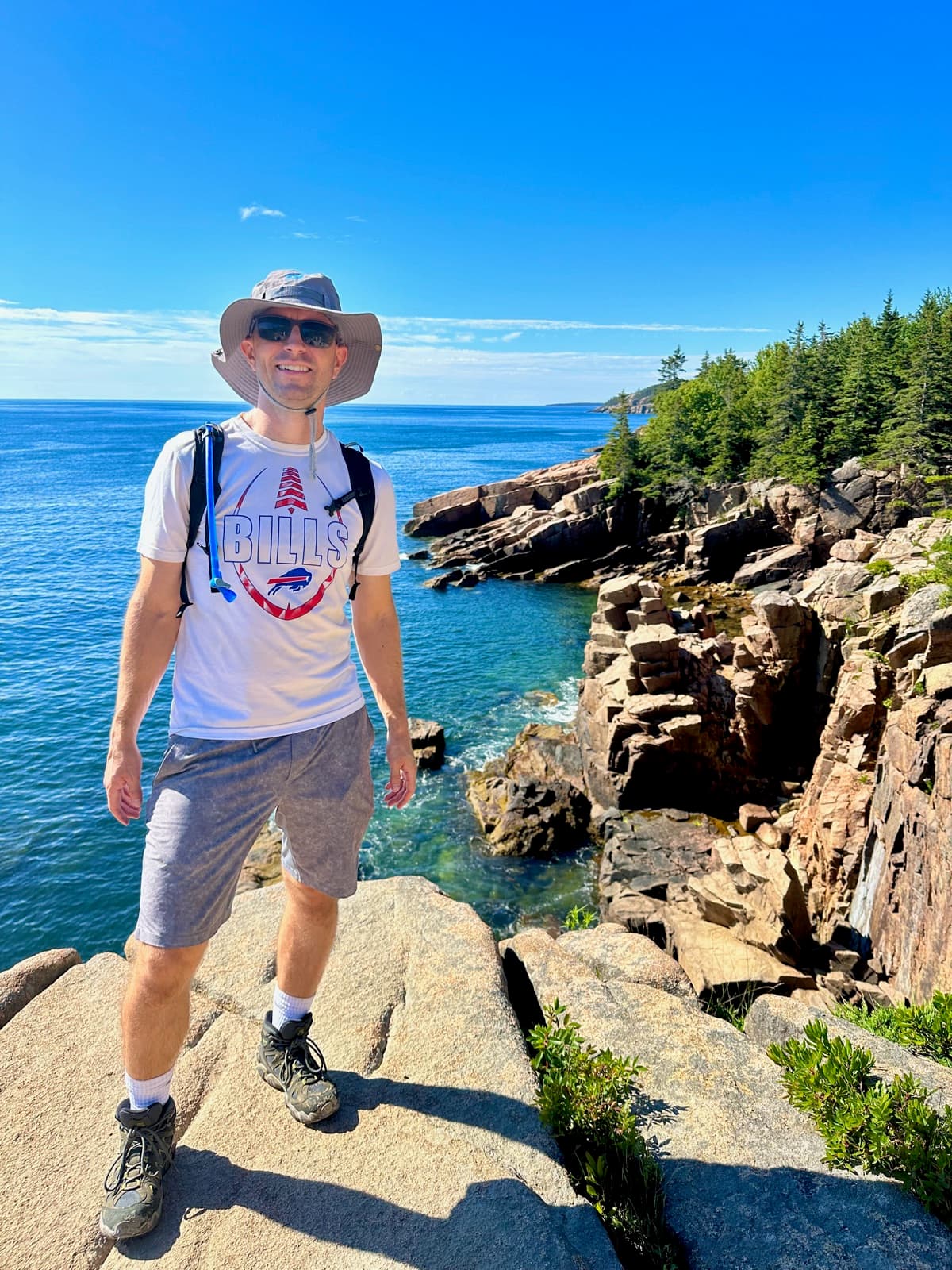 Brett hiking the pink granite coast of Acadia National Park