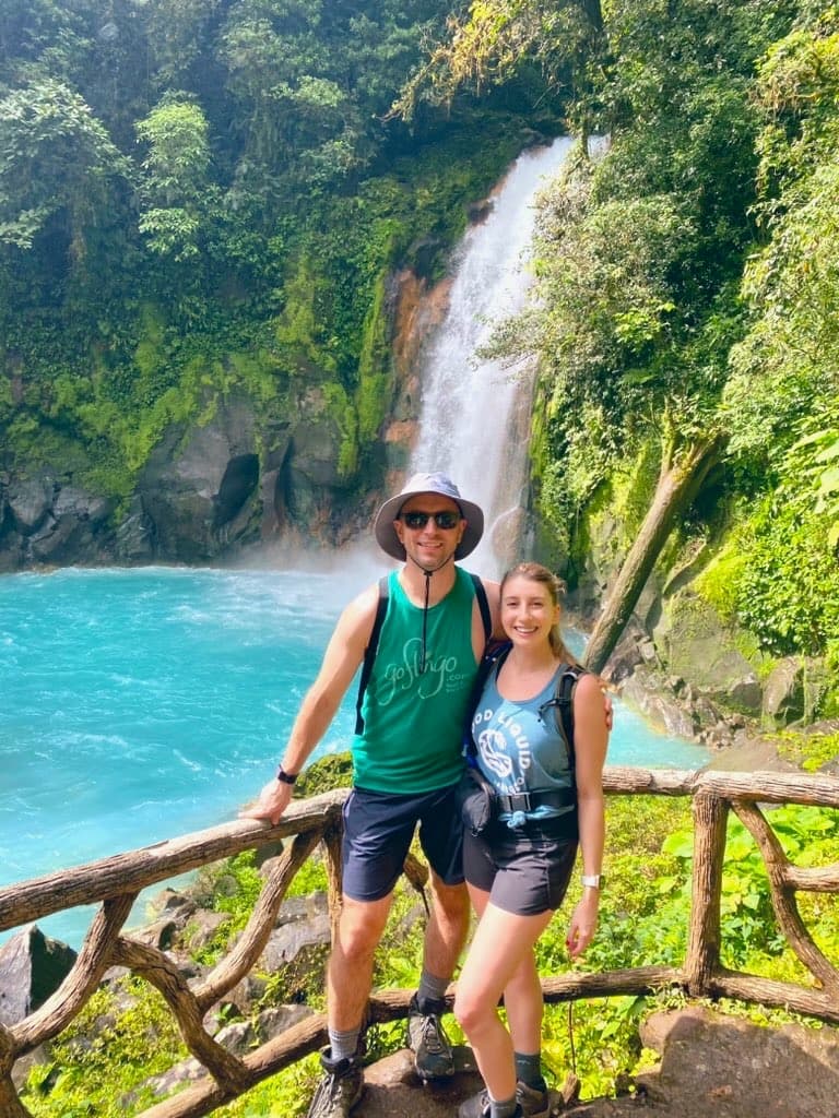 Brett and Erin in front of the Rio Celeste waterfall in Costa Rica