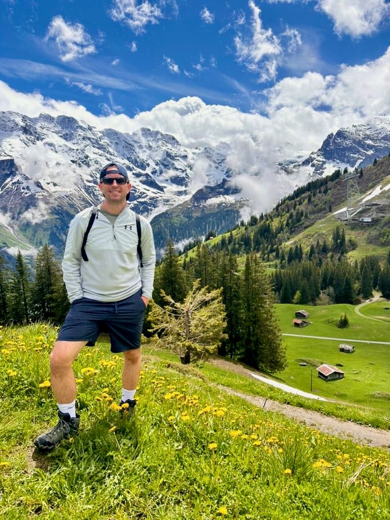 Brett in a wildflower meadow above Lauterbrunnen in the Swiss Alps